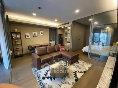 Modern living room with stylish decor and open layout in a contemporary apartment.