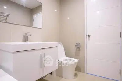 Modern bathroom with sleek fixtures and neutral tones