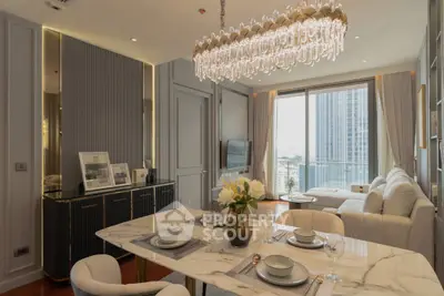 Luxurious living room with elegant chandelier and city view