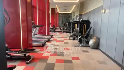 Modern gym with state-of-the-art equipment and vibrant design.