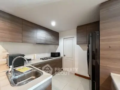 Modern kitchen with sleek cabinetry and stainless steel appliances