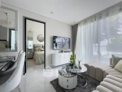 Luxurious modern living room with elegant decor and large windows