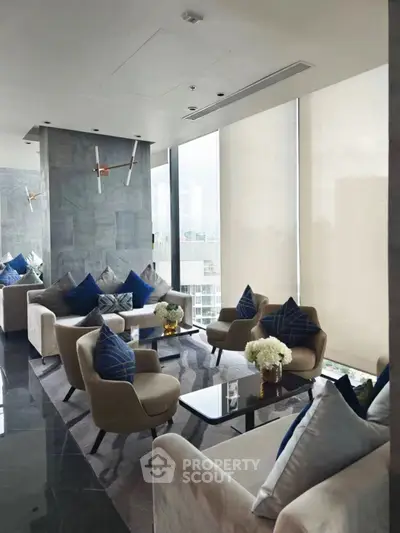 Luxurious modern living room with plush seating and panoramic city views.