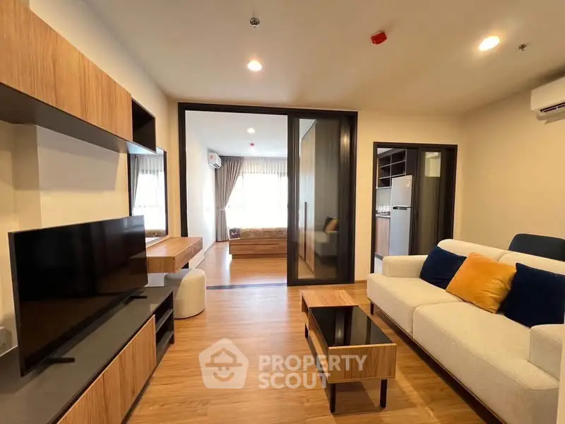Modern living room with stylish furniture and open layout in a contemporary apartment.