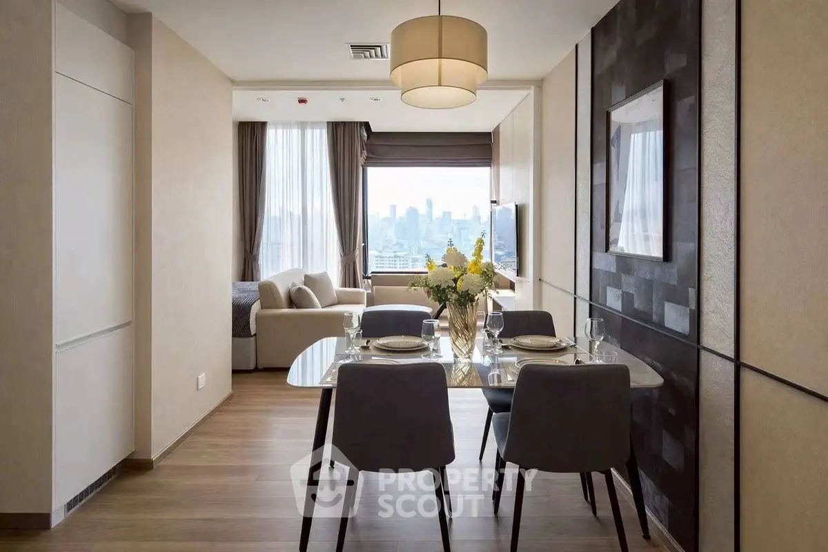 Modern dining area with city view, elegant decor, and stylish lighting in a contemporary apartment.