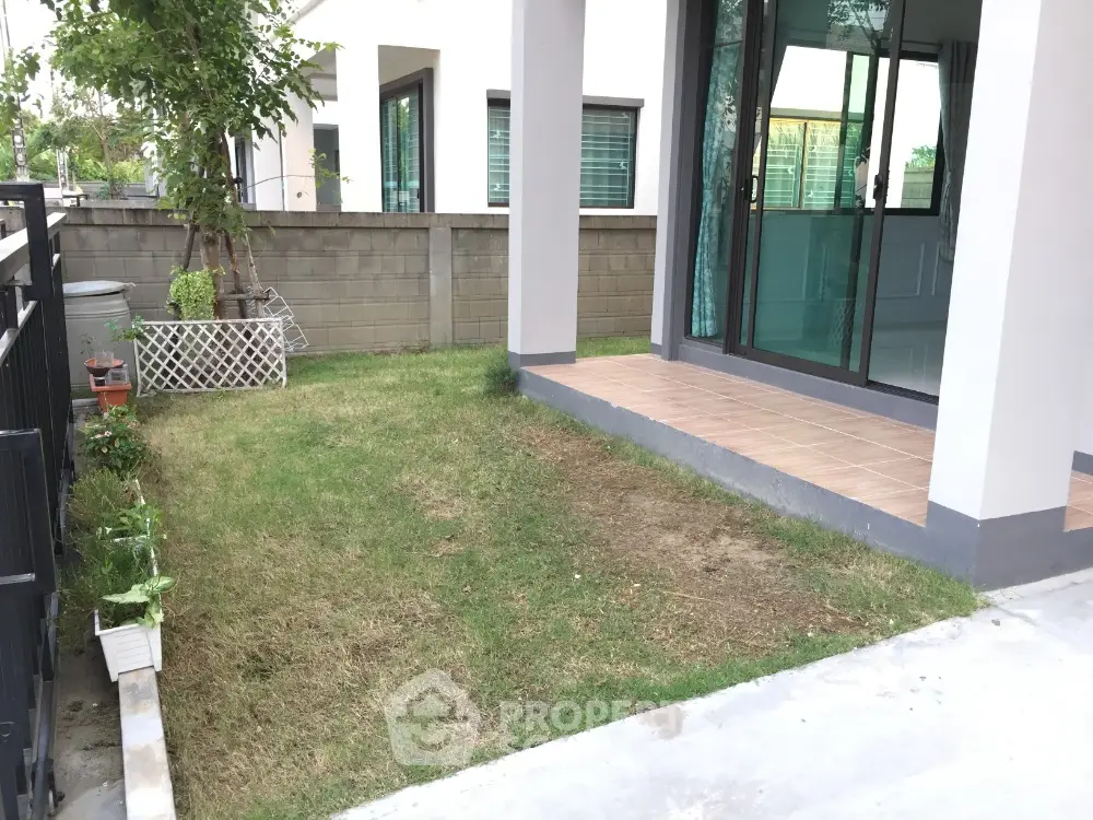 Charming garden view with patio in modern home exterior