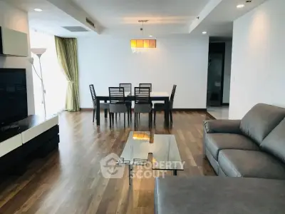 Spacious modern living room with elegant dining area and stylish furniture