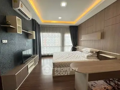 Modern bedroom with stylish wood paneling and ambient lighting