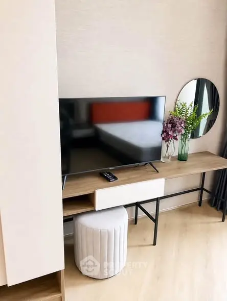Modern living room with sleek TV setup and stylish decor