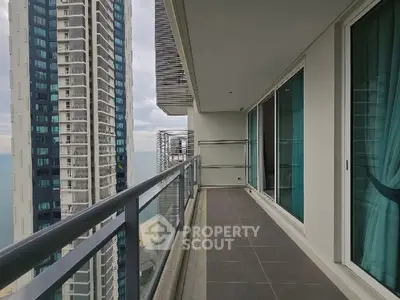 Spacious balcony with stunning high-rise views, perfect for relaxation and enjoying cityscapes.