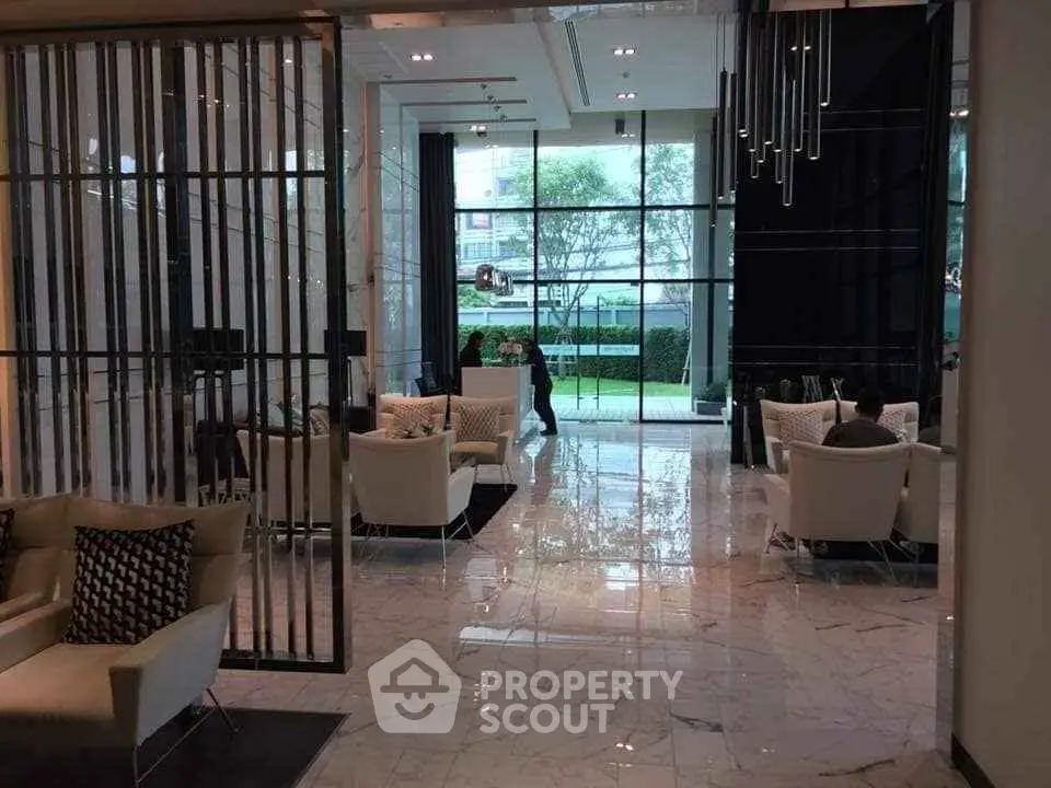 Luxurious modern lobby with elegant seating and large windows