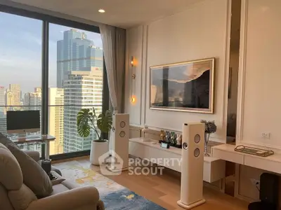 Luxurious living room with stunning city view, modern decor, and high-end audio system in a high-rise apartment.