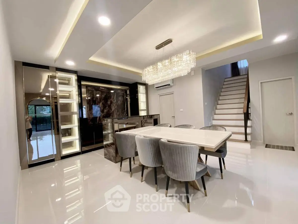 Luxurious dining room with elegant chandelier and modern design