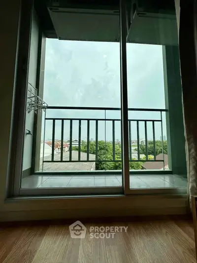 Spacious balcony with scenic view, perfect for relaxation and enjoying the outdoors.