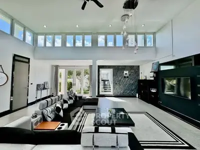 Stunning modern living room with high ceilings and elegant decor