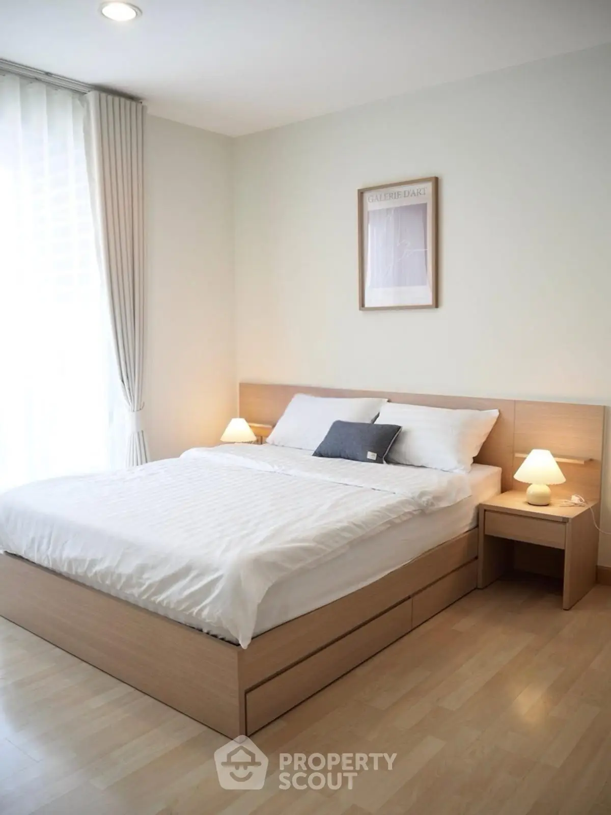 Modern bedroom with cozy wooden bed and soft lighting, perfect for relaxation and comfort.