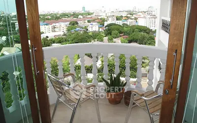 Charming balcony with city view, perfect for relaxation and enjoying the skyline.