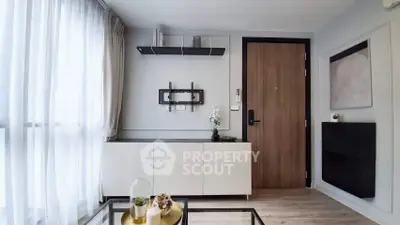 Modern living room with sleek design and natural light