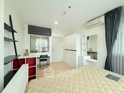 Modern bedroom with stylish decor and ample natural light