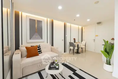 Modern living room with stylish decor and cozy seating area in a contemporary apartment.
