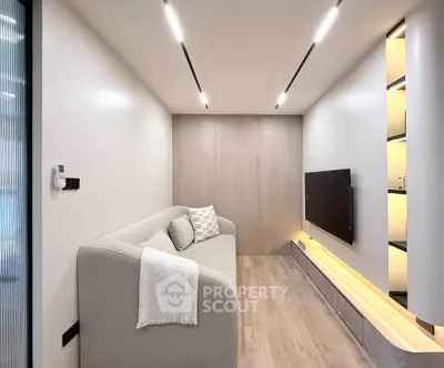 Modern minimalist living room with sleek design and cozy ambiance