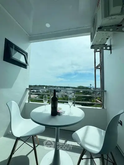Charming balcony with scenic view, perfect for relaxation and entertaining guests.