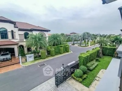 Luxurious suburban neighborhood with elegant homes and lush greenery