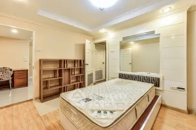 Spacious bedroom with modern design and built-in storage solutions