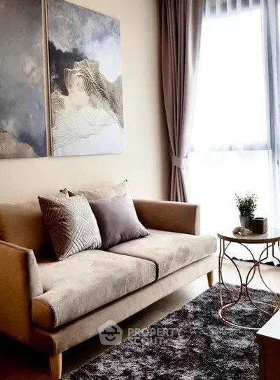Elegant living room with modern sofa, abstract art, and natural light