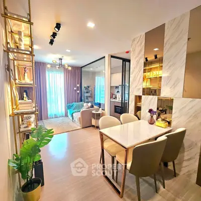 Modern open-plan living and dining area with stylish decor and ample natural light.