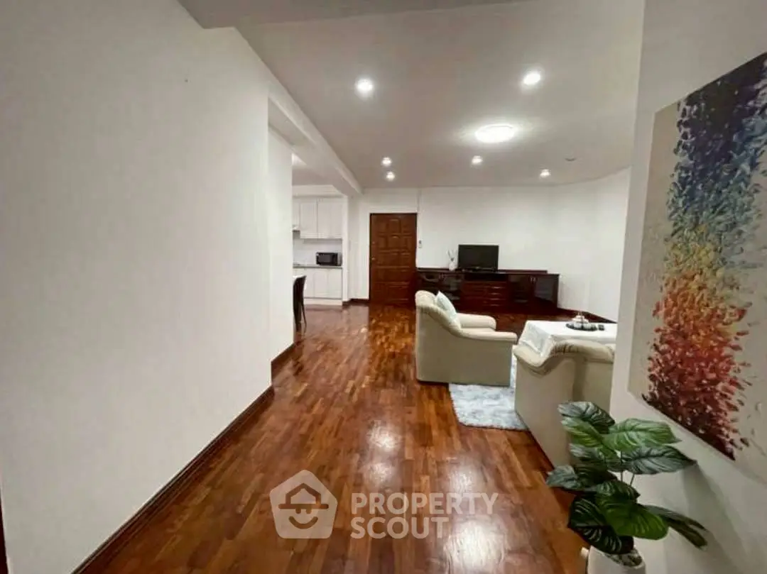 Spacious living room with wooden flooring and modern decor