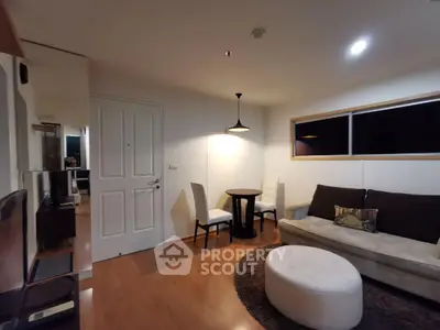 Cozy living room with modern decor and soft lighting