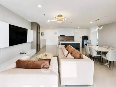 Spacious modern living room with open kitchen and elegant dining area