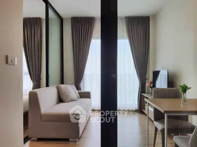 Modern living room with elegant decor and natural light in a stylish apartment.