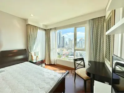 Luxurious bedroom with stunning city view and elegant furnishings