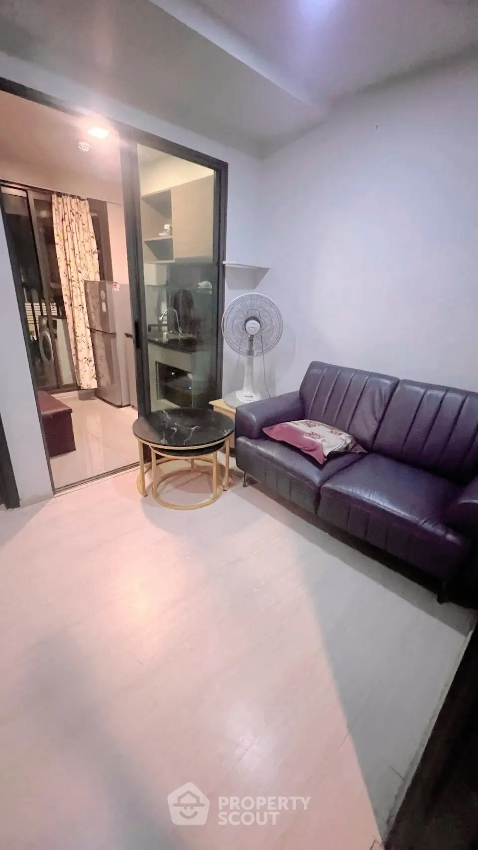 Cozy living room with leather sofa and modern decor