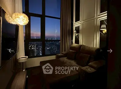 Luxurious living room with stunning city view and elegant lighting