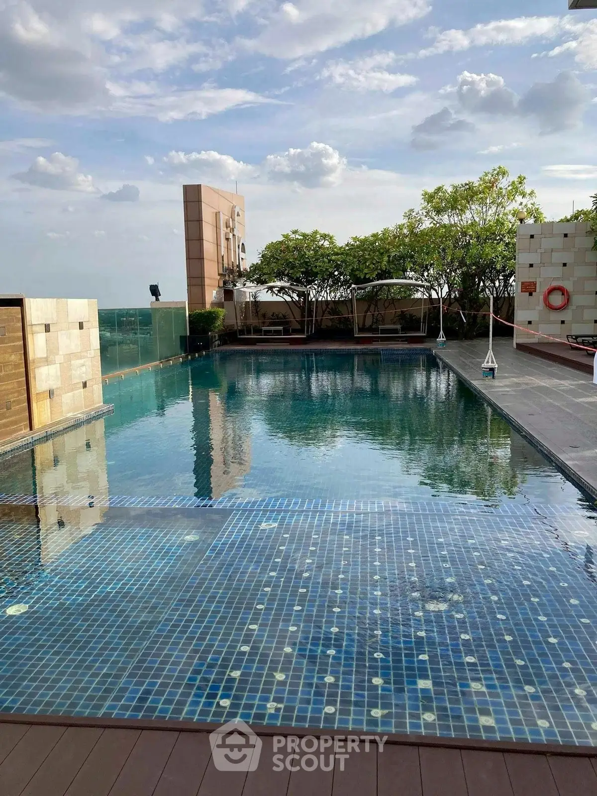 Luxurious rooftop pool with stunning city views and elegant design.