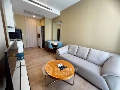 Modern living room with stylish furniture and open layout in a contemporary apartment.