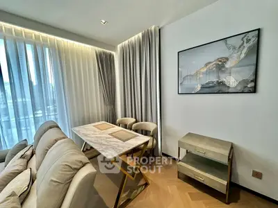 Elegant modern living room with marble table and plush seating