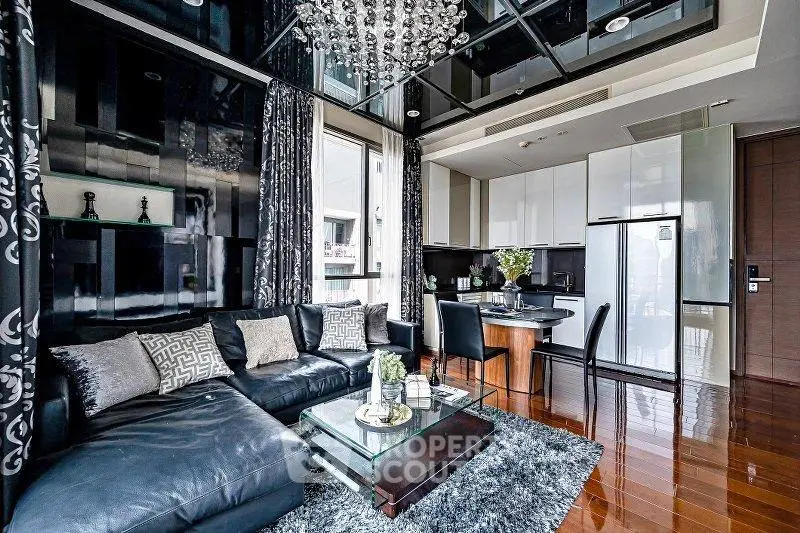 Luxurious modern living room with elegant decor and open kitchen layout