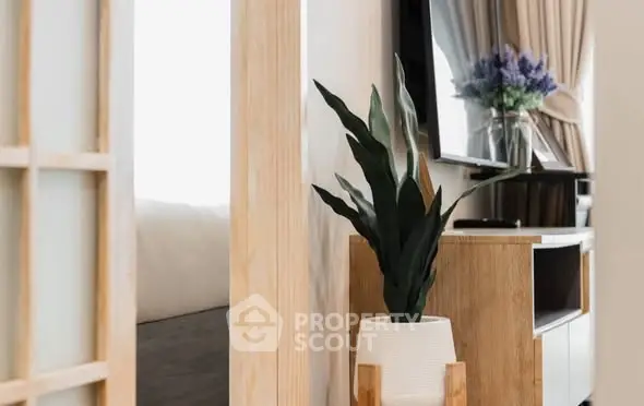 Modern bedroom with stylish decor and natural light