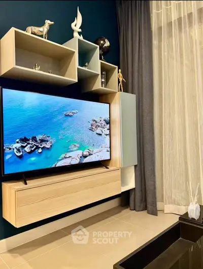 Modern living room with stylish TV unit and elegant decor