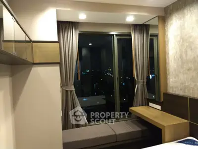 Modern bedroom with city view and stylish decor