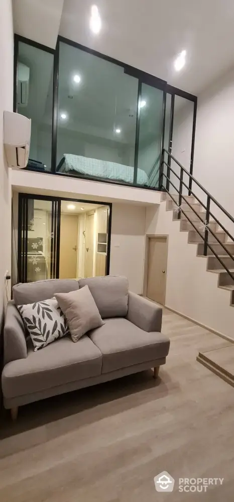 Modern loft apartment with mezzanine bedroom and stylish living area