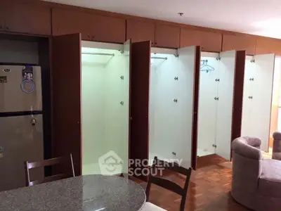 Spacious apartment with open closets and modern furniture