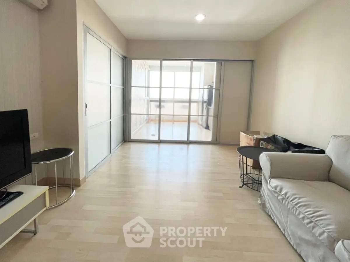 Spacious living room with sliding glass doors and modern decor