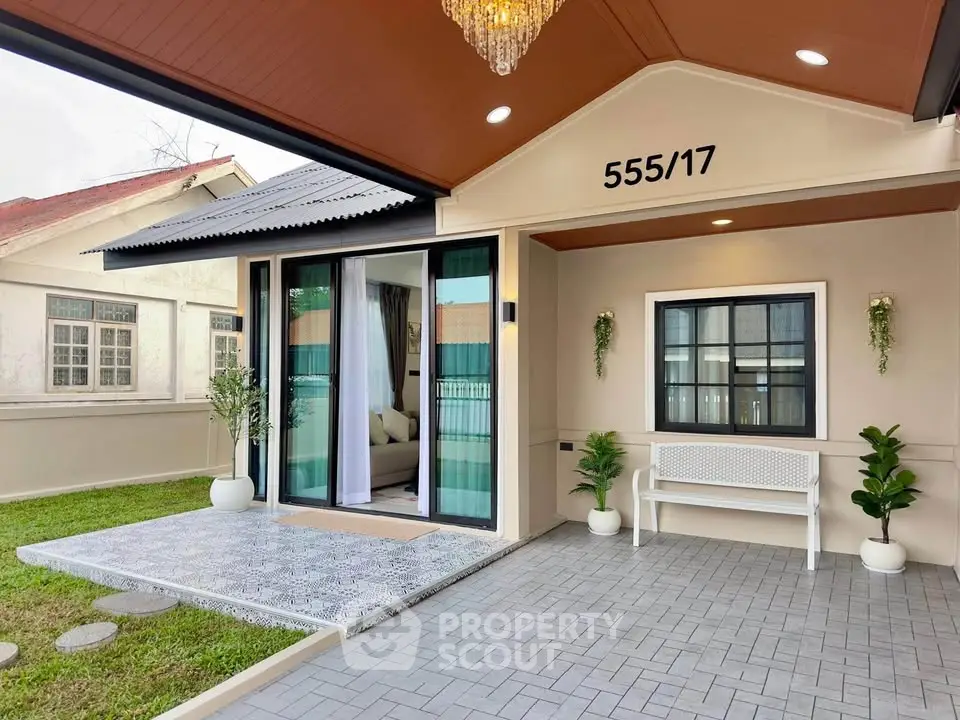 Charming modern home exterior with elegant entrance and lush garden