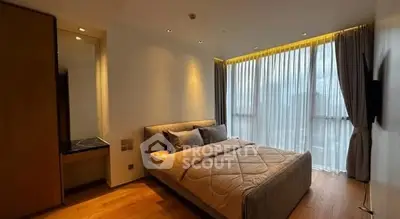 Luxurious bedroom with floor-to-ceiling windows and elegant decor