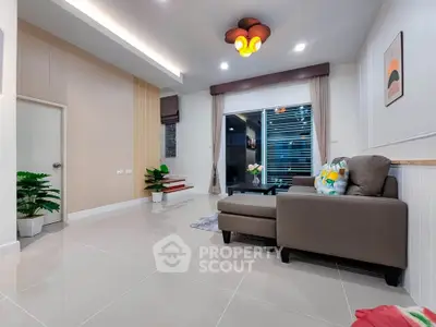 Spacious modern living room with stylish decor and comfortable seating